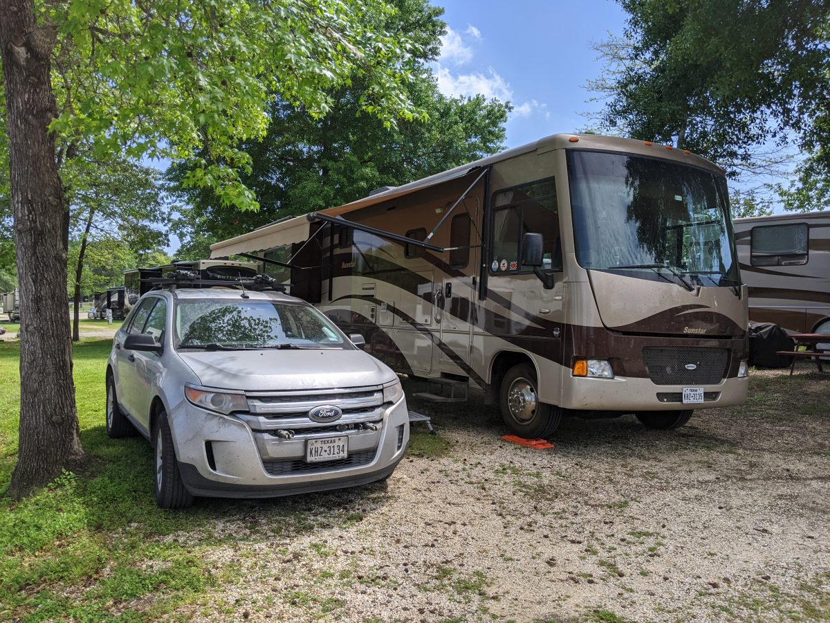 My motorhome and car parked at Escapee's Rainbow's End